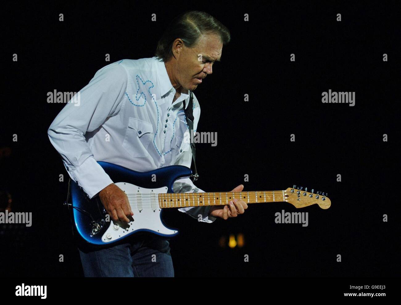 Glenn Campbell in Concert. American Country and Western singer Glenn Campbell performing at the Hammersmith Apollo, London. Stock Photo