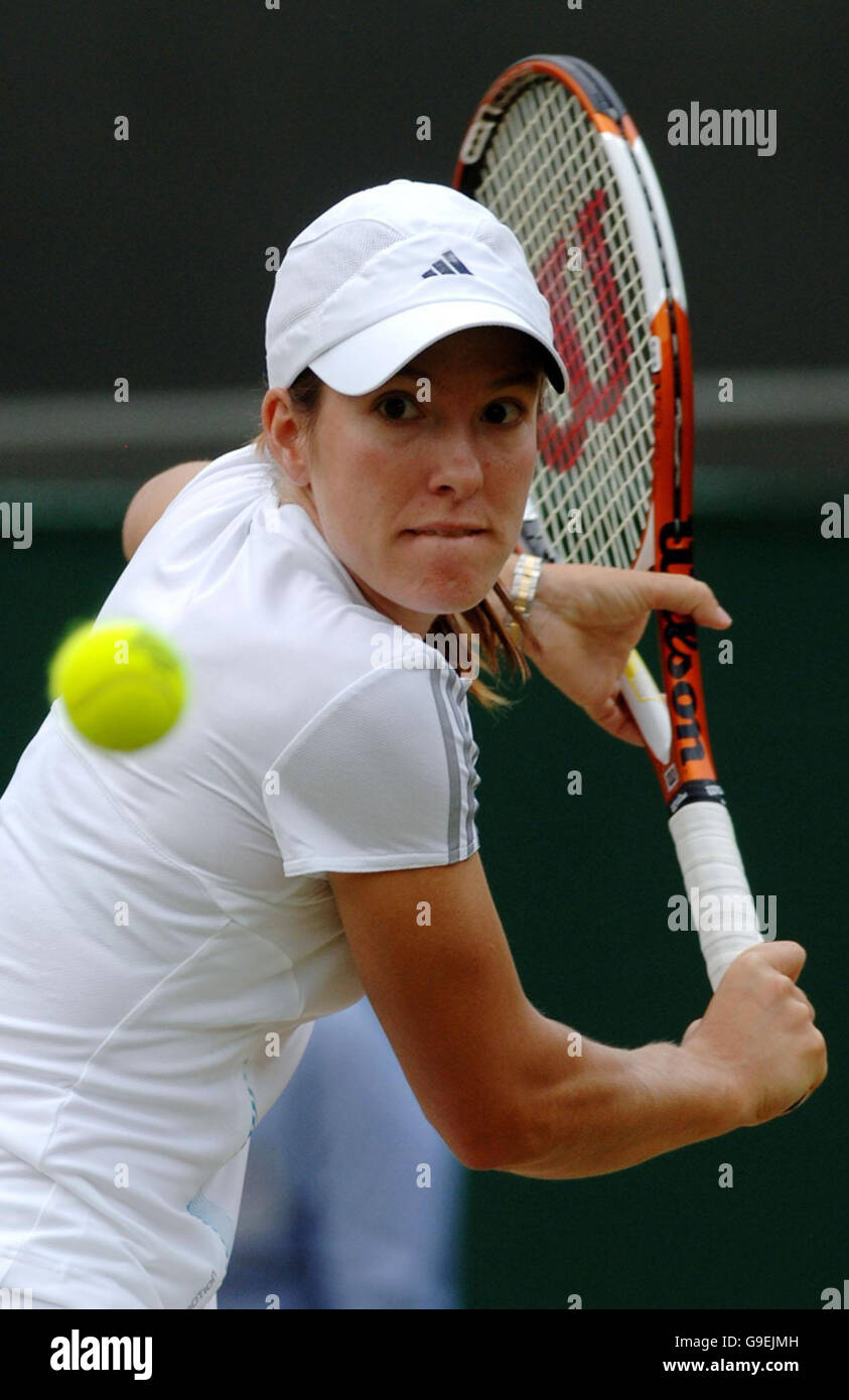 Belgium's Justine Henin-Hardenne in action against France's Severine Bremond during the quarter final match of The All England Lawn Tennis Championships at Wimbledon. Stock Photo
