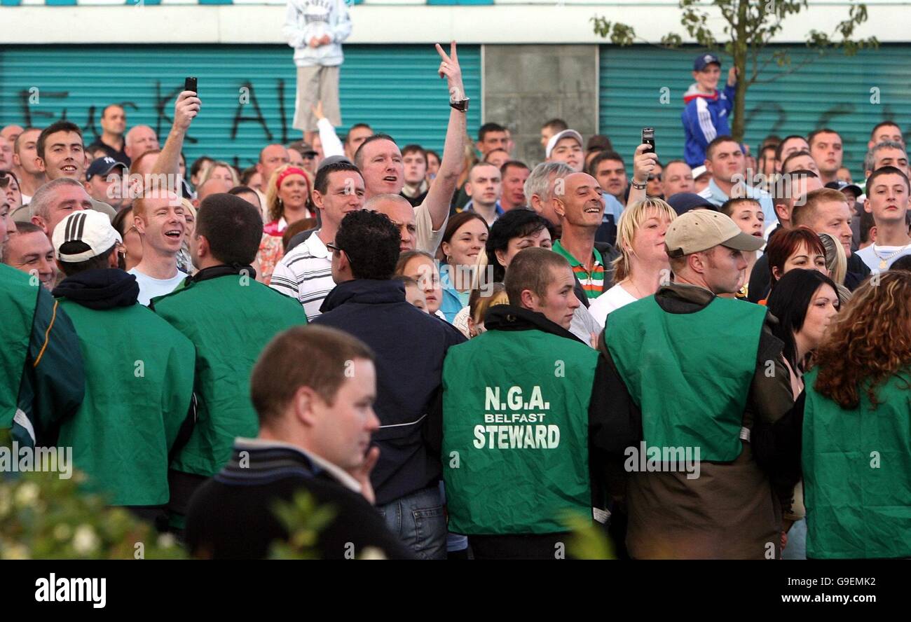 Orangemen Riots Nationalist protestors are held back by marshalls as a Orange parade ...