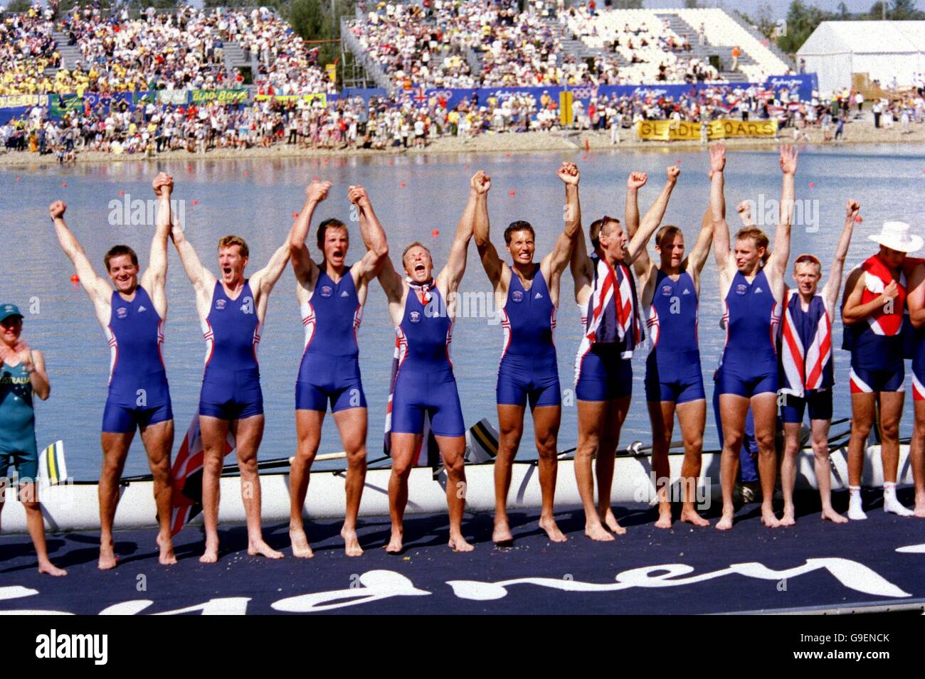 The victorious Great Britain Men's Eight celebrate their Gold medal success, (l-r) Andrew Lindsay, Ben Hunt-Davis, Simon Dennis, Louis Attrill, Lukar Grubor, Kieran West, Fred Scarlett, Steve Trapmore, and cox Rowley Douglas Stock Photo