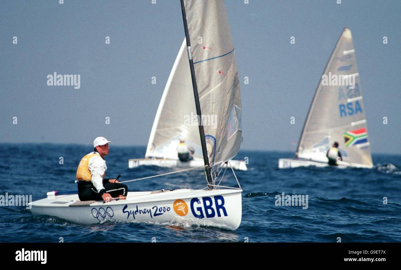 Sydney 2000 Olympics -Sailing - Men's Finn Fleet Races 7. Great Britain's Iain Percy leads the field in the Men's Finn Races Stock Photo