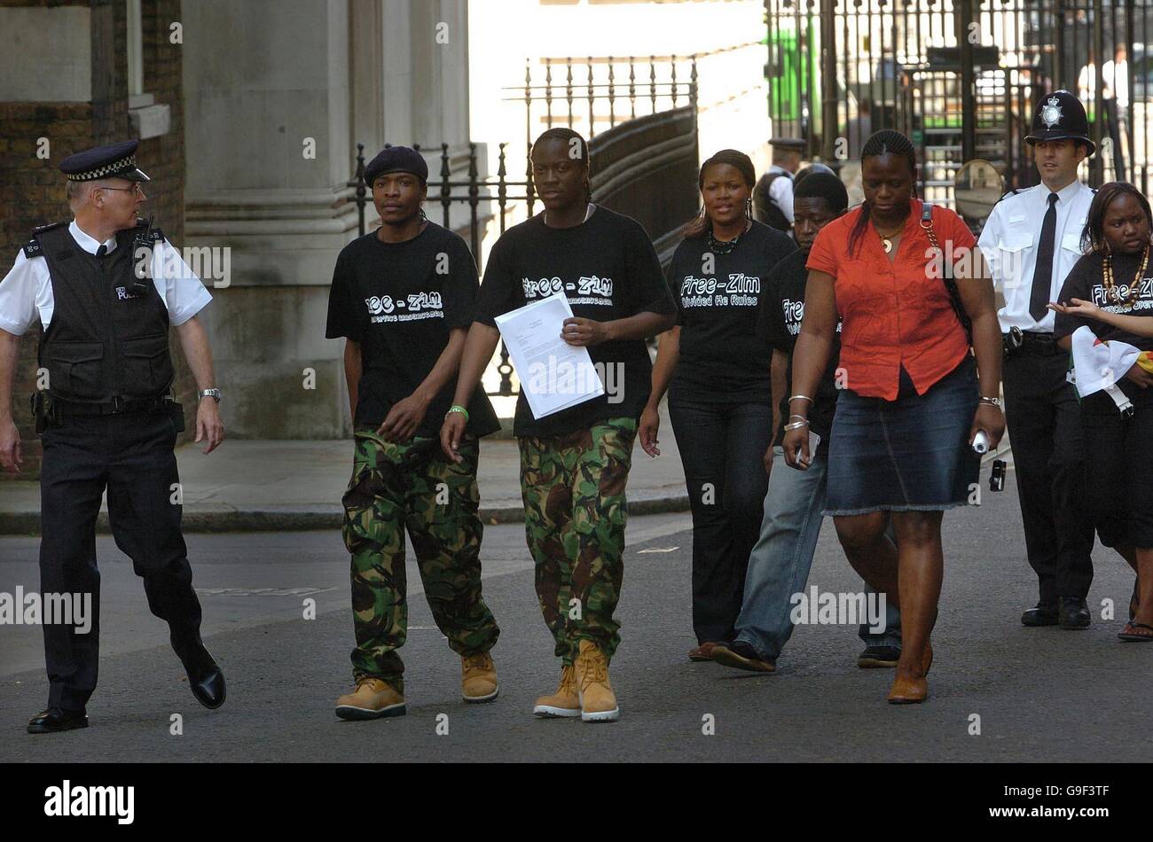 A group of Zimbabweans living in Britain arrive to hand in a letter