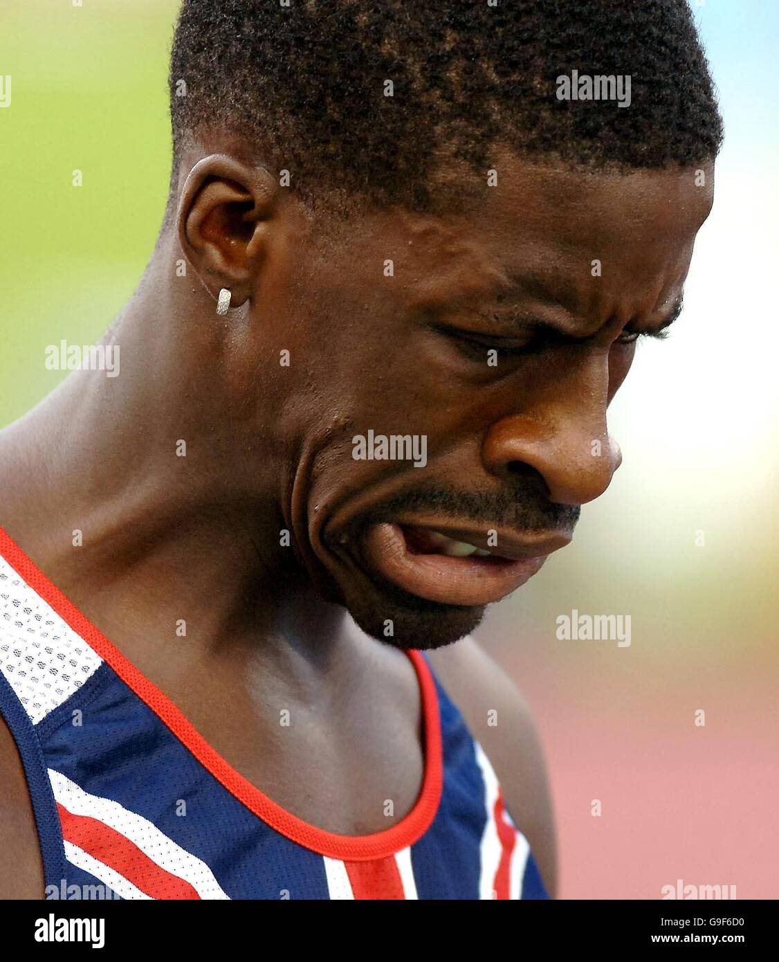 Great Britain's Dwain Chambers looks dejected after finishing fourth in