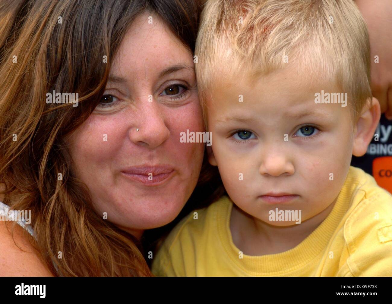 Leon Smith, 3, from Braintree, Essex is reunited with his mum Melinda Smith at their home in Braintree. PRESS ASSOCIATION Photo Picture date Friday August 11 2006. The toddler went missing yesterday after taking a solo bus trip from Braintree to Colchester.See PA Story POLICE Boy. Photo credit should read Chris Radburn/PA Stock Photo