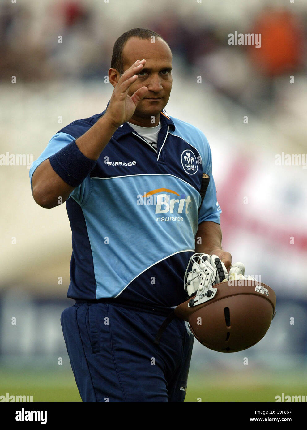 Surrey Brown Caps' captain Mark Butcher waves goodbye to the crowd