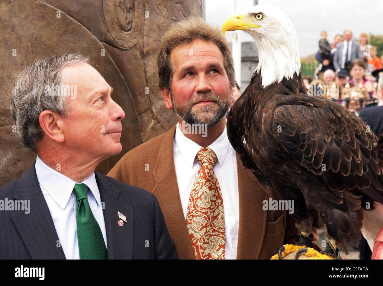 New York's Mayor Michael Bloomberg (left) meets a Bald Eagle and its unnamed handler (centre) during the unveiling of a monument to the Fighting 69th Regiment in Ballymote, County Sligo, today. Stock Photo