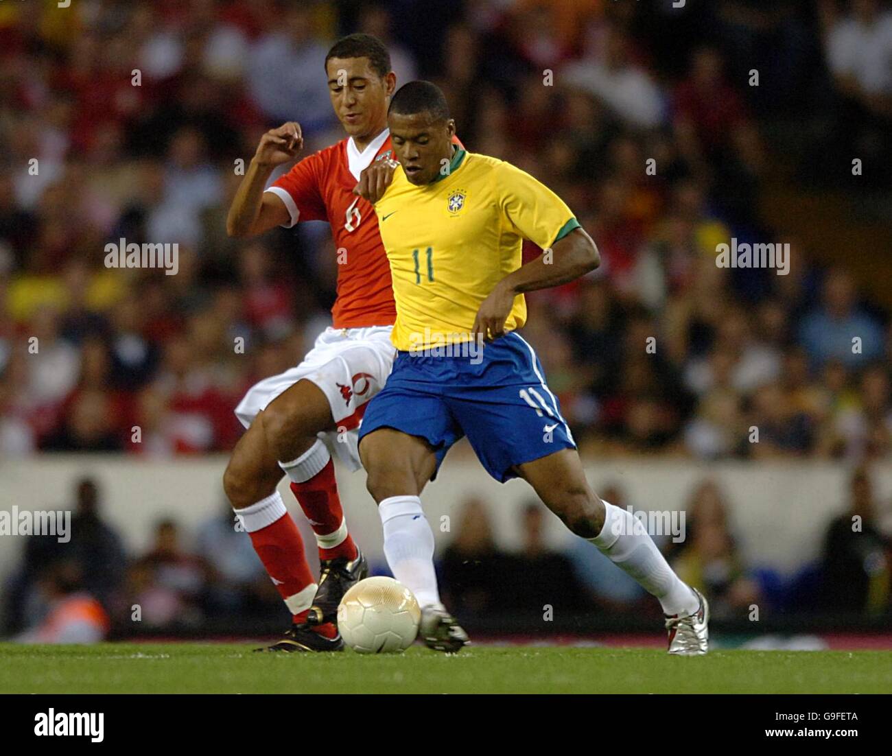 Soccer - International Friendly - Brazil v Wales - White Hart Lane. Wales' Lewin Nyatanga and Brazil's Julio Baptista Stock Photo