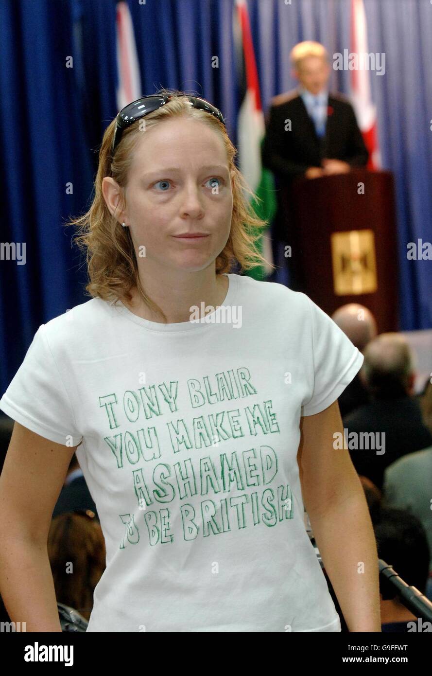 British woman Kirsty (surname not known) who lives in Ramallah wearing a T shirt protesting about Prime Minister Tony Blair during the joint Press Conference between Blair Minister and Palestinian President Mahmoud Abbas at the Presidential Compound in Ramallah, West Bank . Stock Photo
