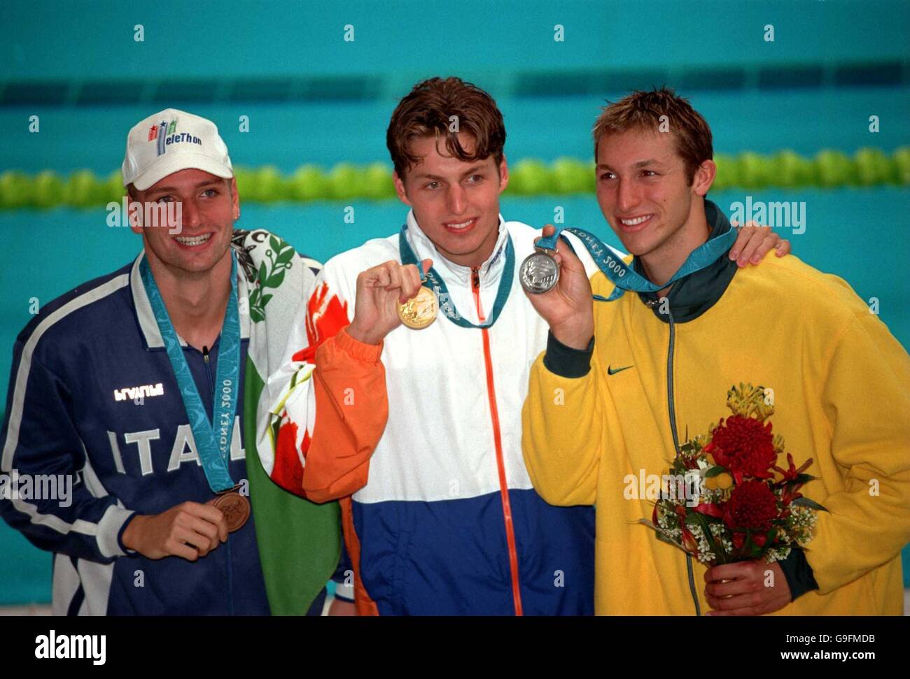 (L-R) The three medalists Massimiliano Rosolino, Italy (bronze) Pieter van den Hoogenband, Netherlands (gold) and Ian Thorpe, Australia (silver) Stock Photo