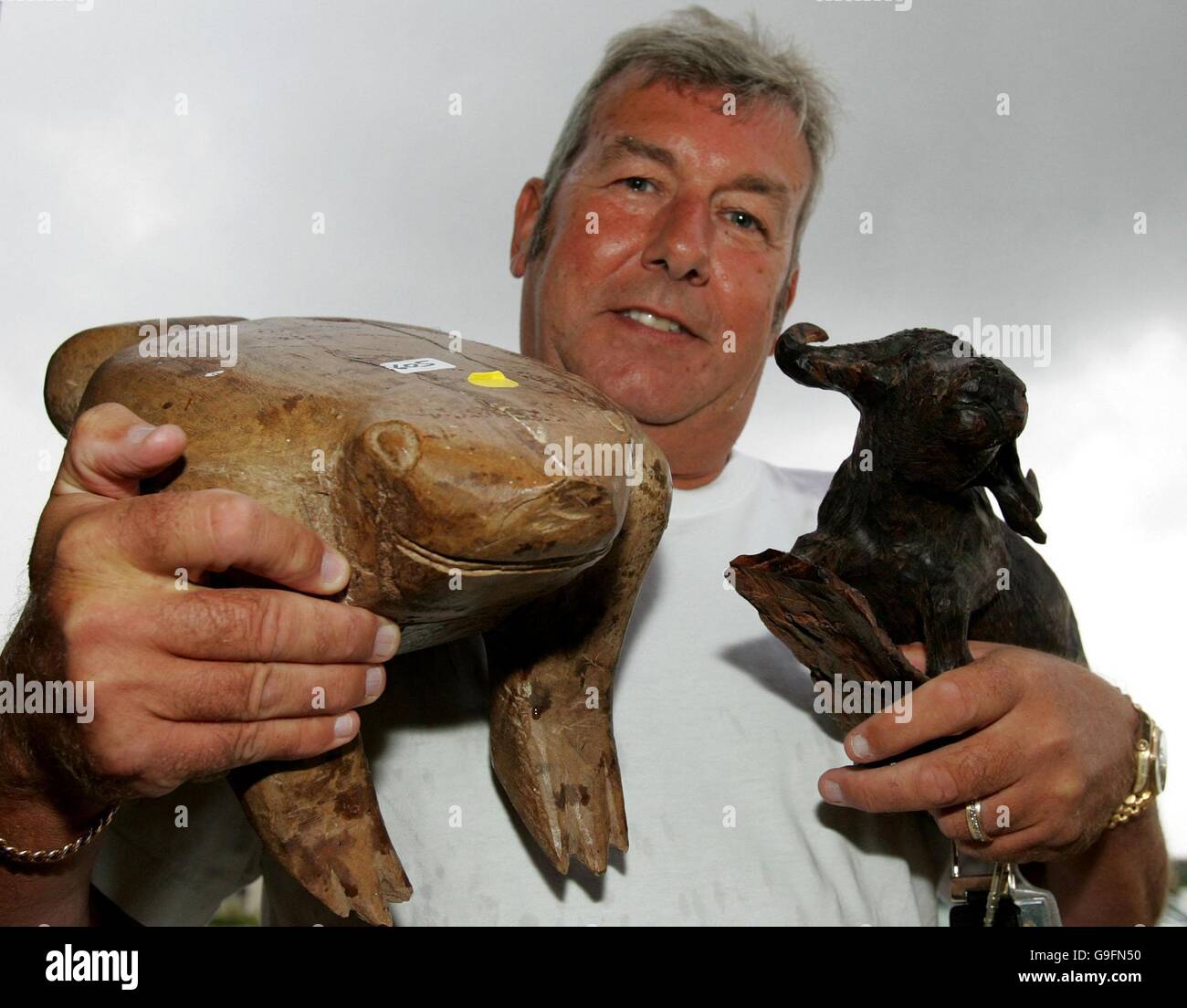 Lot No 605: A collection of wooden carvings, including a Frog and a Water Buffalo, bought by Paul Reeve at an auction of items belonging to Prince and Princess Michael of Kent Stock Photo