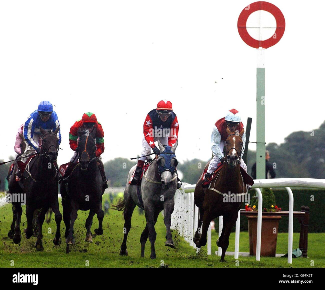 Peppertree Lane, ridden by Kevin Darley (right) wins the Betfredpoker.com Old Borough Cup Heritage Handicap at Haydock racecourse. Stock Photo