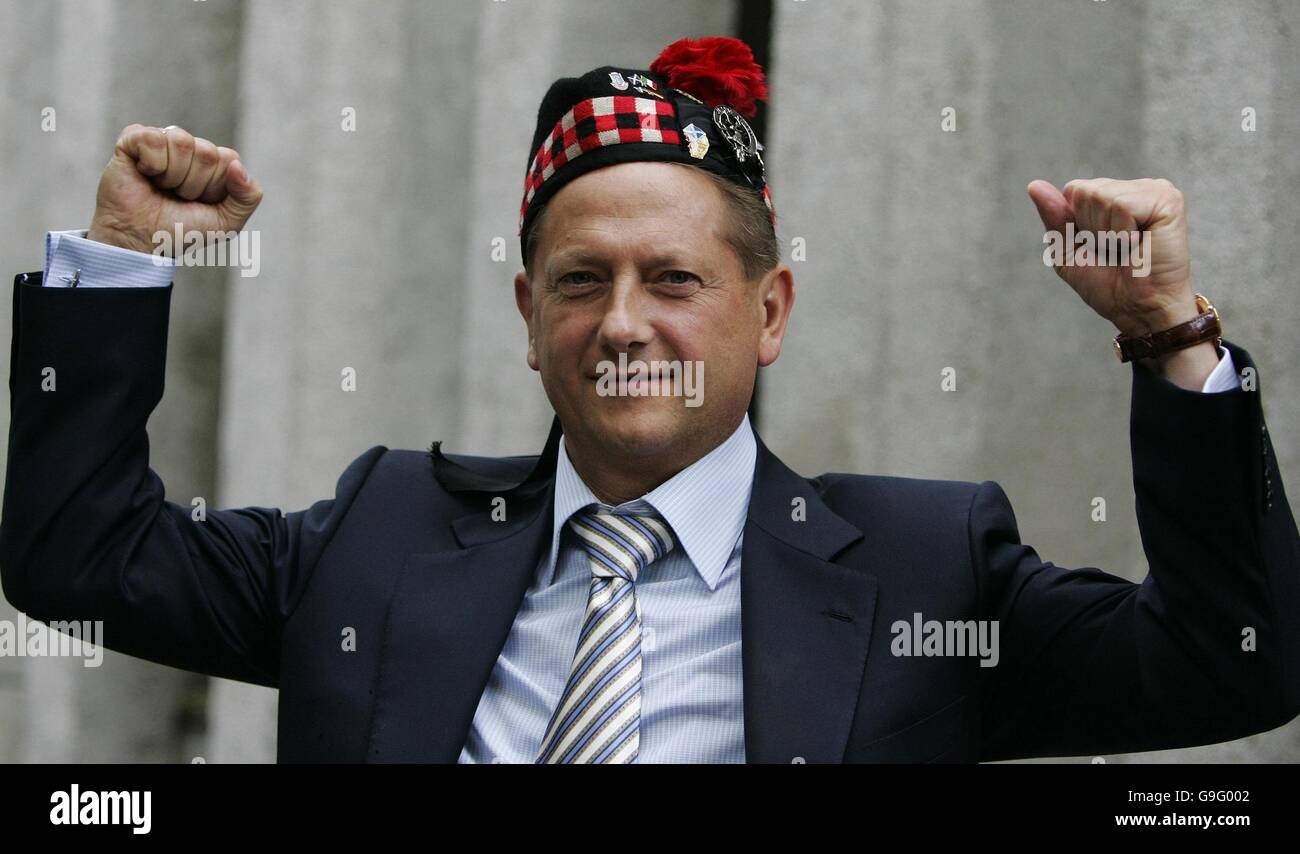 Hearts Football club owner Vladimir Romanov with a Glengarry hat on as he meets Scotland fans in Kaunas, Lithuania. Stock Photo