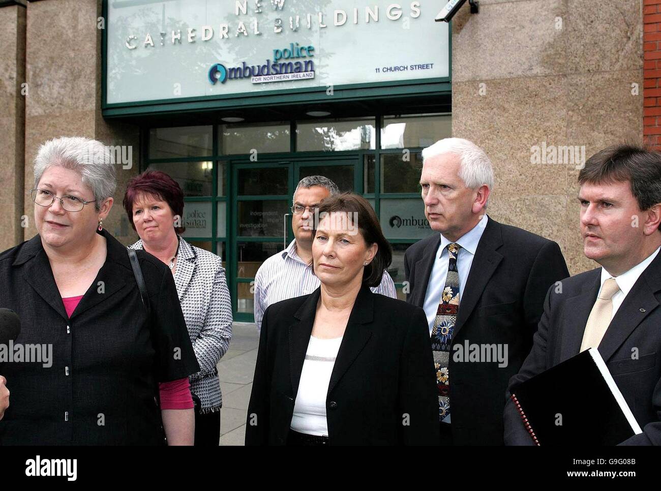 (From the left) Jane Winter, British/Irish Rights Watch, Elizabeth Ferguson, John Torney's sister, John Torney's sister-in-law, Hilary, front centre, SDLP's Tim Attwood, behind her, John Torney's brother, Samuel and Jeffrey Donaldson M.P. stand outside the Ombudsmans office in Belfast, after it was announced that a new avenue could be probed in a bid to clear the name of former police officer John Torney, who was convicted of murdering his wife and two children. Stock Photo