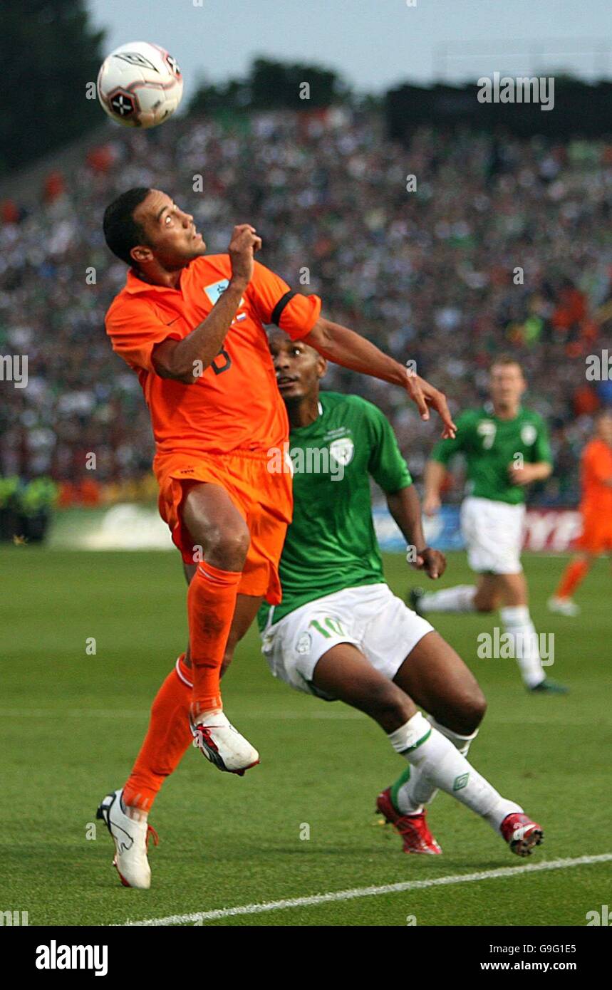 Landzaat Rms Holland's Denny Landzaat (left) clears the ball away from Republic of ...