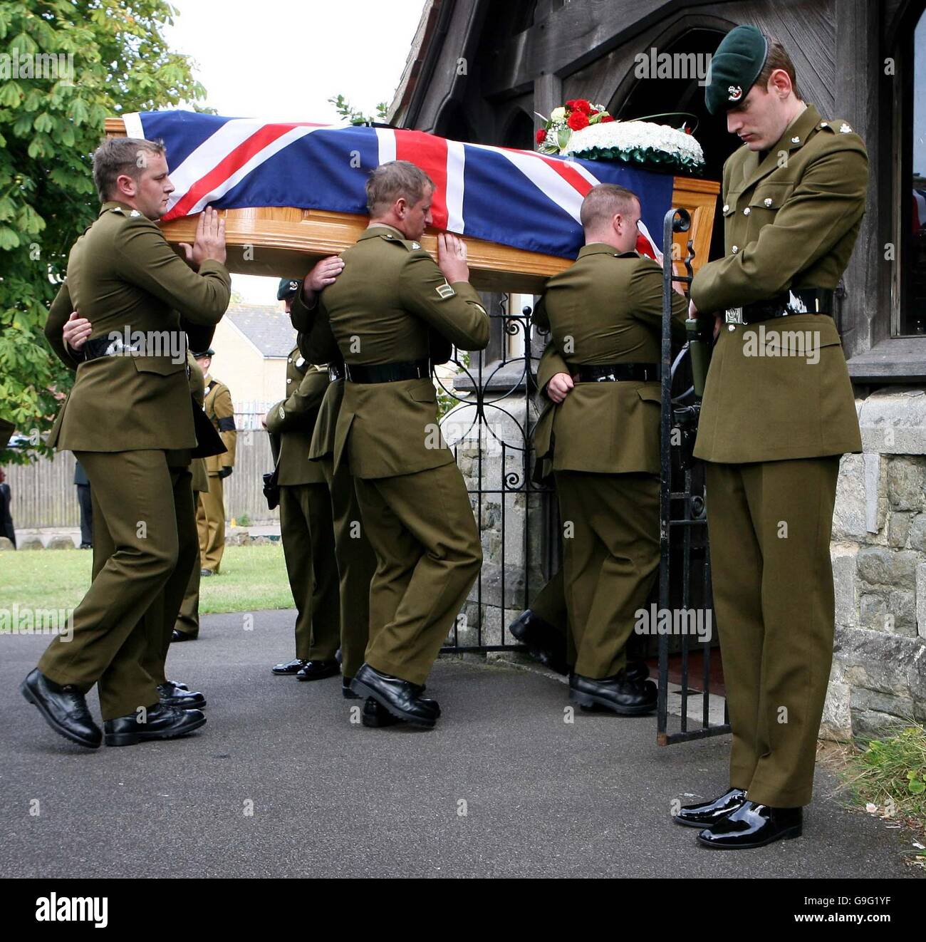The coffin of Corporal Matthew Cornish of the 1st Battalion The Light Infantry arrives at All Souls Church in Cheriton, Folkestone, Kent, after being killed in an explosion in Basra, Iraq, on August 1st. Stock Photo