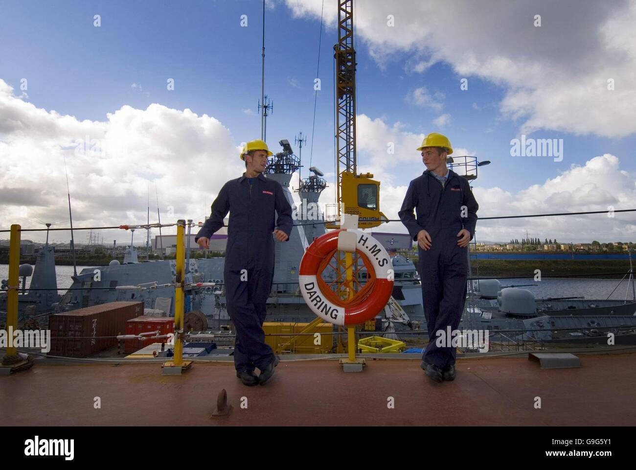 Gavin Law, 17 from Bishopbriggs (left) and Alan Wells, 17 from Renfrew on HMS. They are two of 70 new apprentices turning up for their first day of work on the BAE apprenticeship scheme at Clyde shipyard, Glasgow. Stock Photo