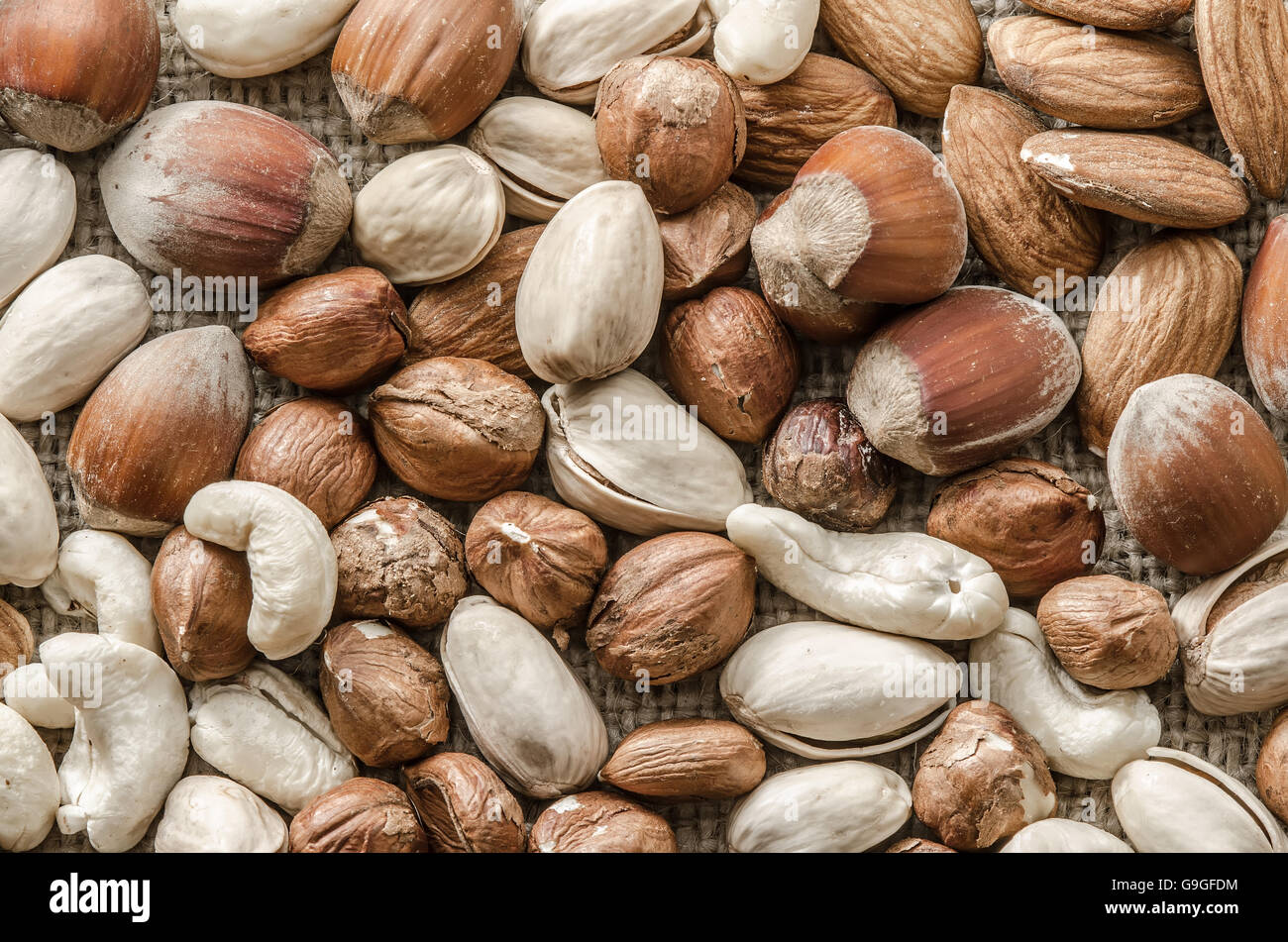 Group of different nuts isolated on bagging Stock Photo