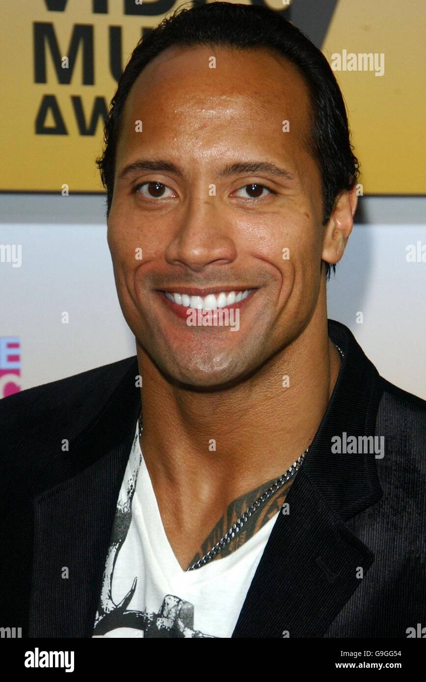 AP OUT The Rock arrives at the MTV Video Music Awards at Radio City, New York. Stock Photo