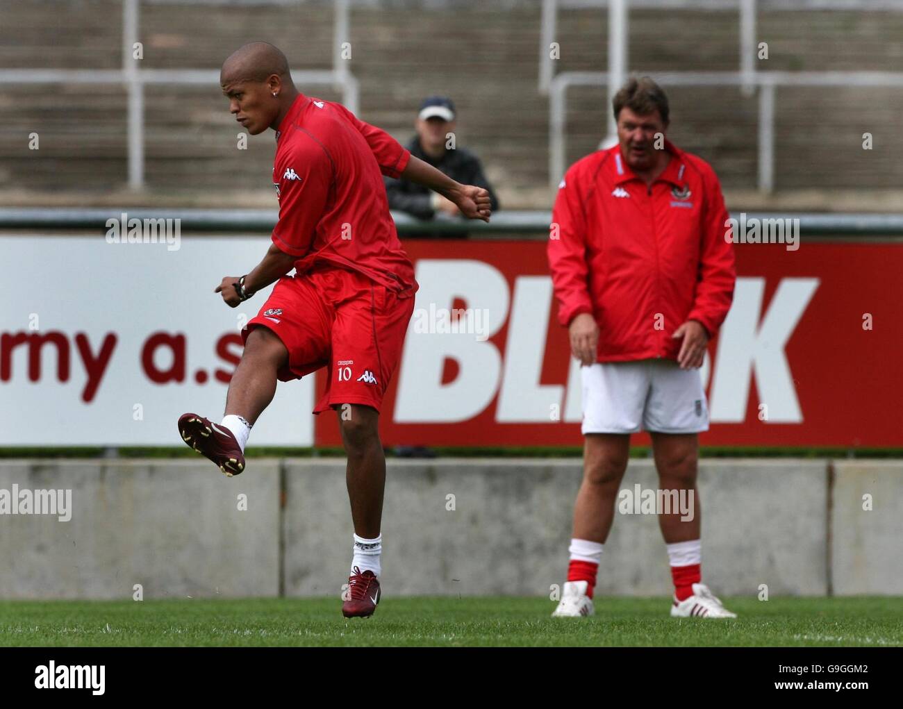 Soccer - Wales training session - Prague, Czech Republic. Wales' Robert Earnshaw is watched by manager John Toshack (right) during a training session at the Stahov Stadium, Prague Czech Republic. Stock Photo
