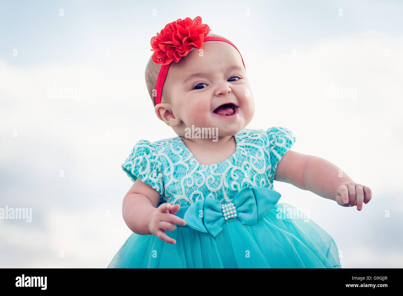 cute baby with blue dress