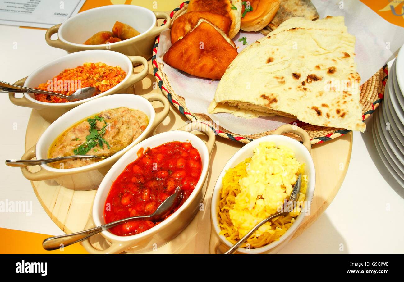 Balaleet, Harees and Margoog traditional Persian Gulf Arabic cuisine dishes served in café in the Manama Souk, Bahrain Stock Photo