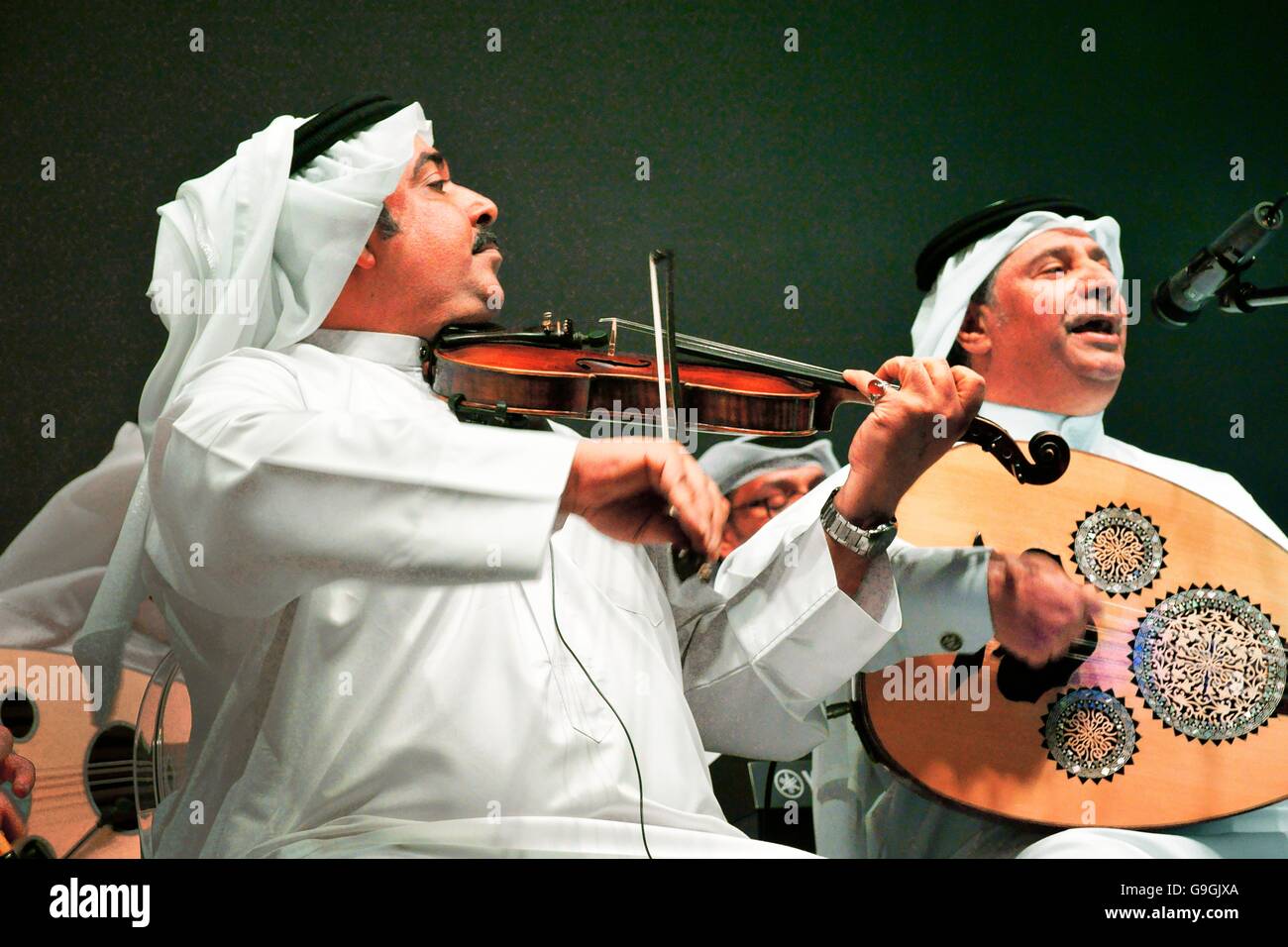 Musicians of the Mohammed bin Faris Ensemble Band play traditional sawt music in Al Khalifa Centre in Muhurraq district, Bahrain Stock Photo