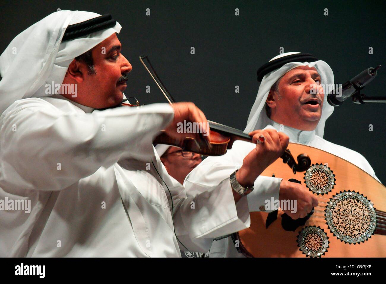 Musicians of the Mohammed bin Faris Ensemble Band play traditional sawt music in Al Khalifa Centre in Muhurraq district, Bahrain Stock Photo