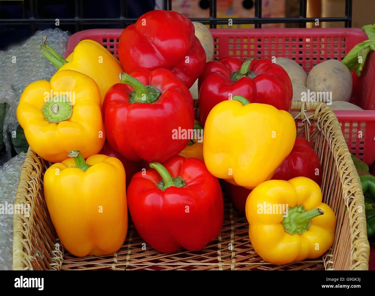 Colorful sweet or bell peppers are sold at a farmers market Stock Photo ...