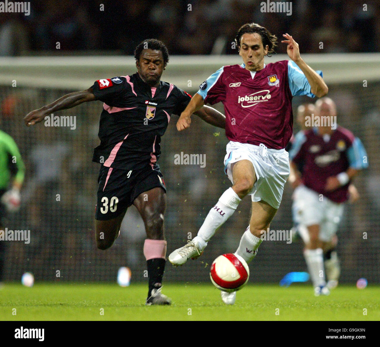 West Ham United's Yossi Benayoun and Palermo's Fabio Simplicio. Stock Photo