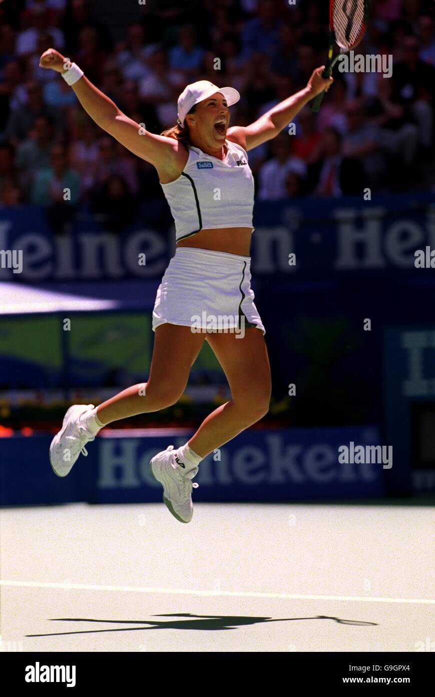 Jennifer capriati celebrates winning final australian open against