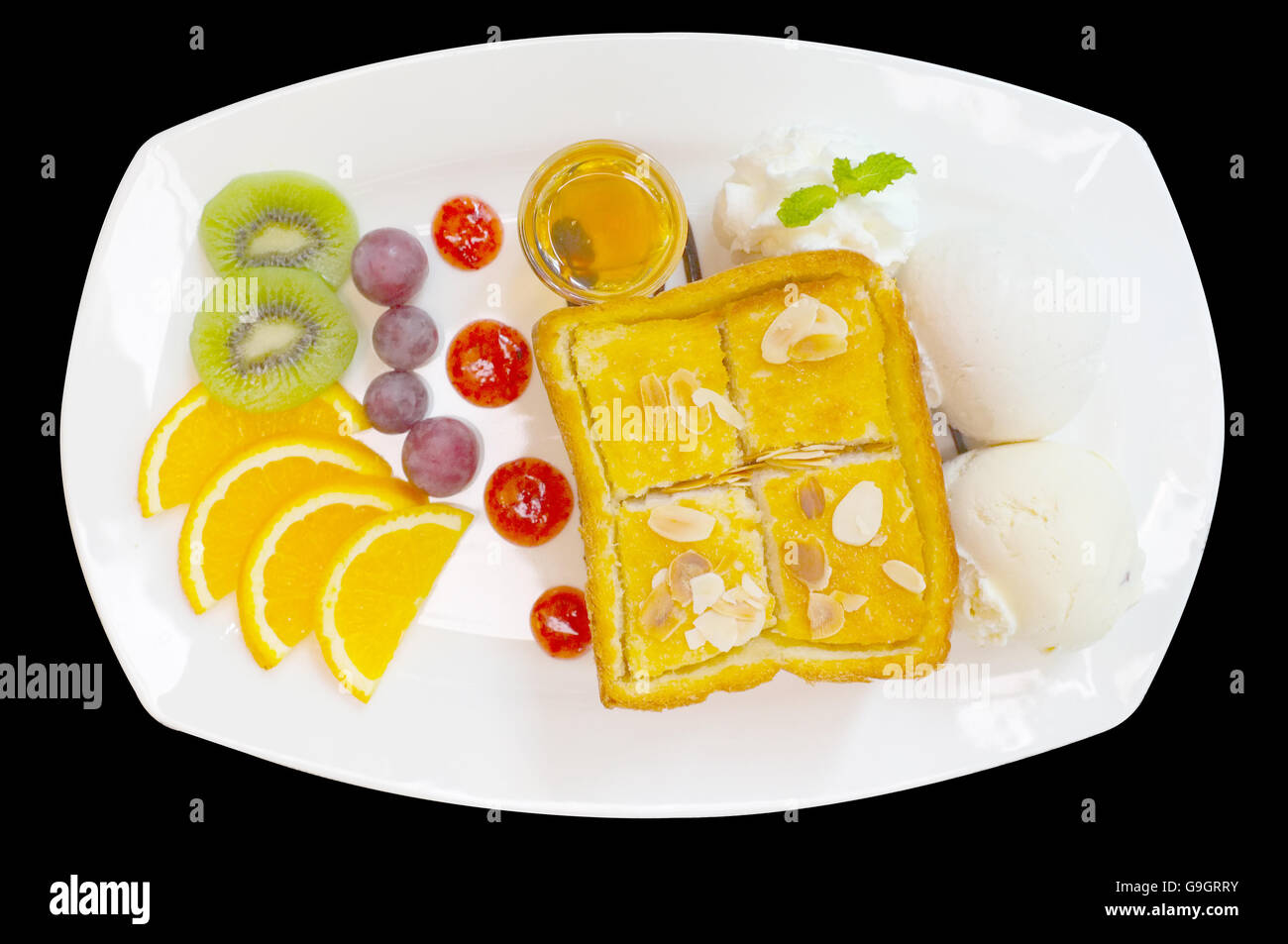 Honey toast with mixed fruit and icecream Stock Photo