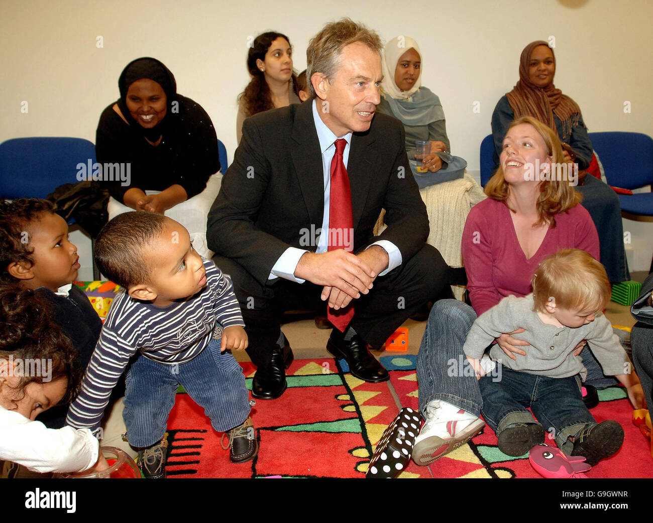 The Prime Minister Tony Blair enjoys the company of small children and