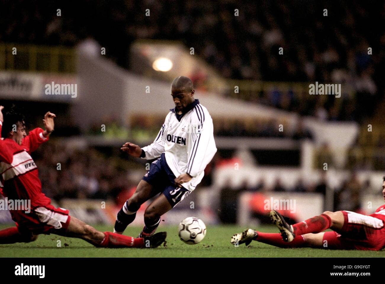 Tottenhams alton thelwell gets past middlesbroughs keith oneill hires