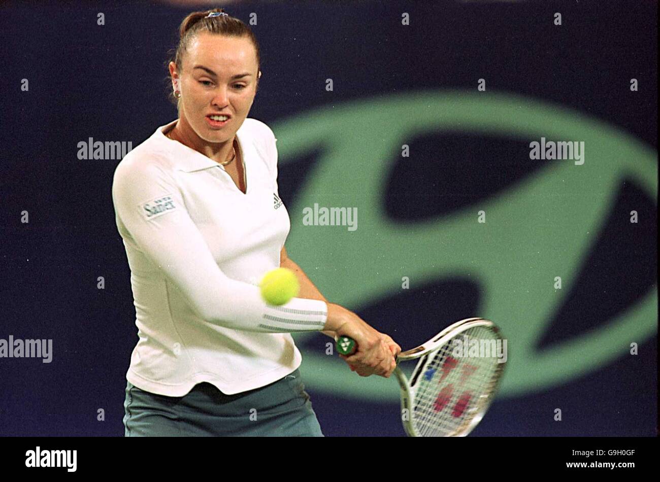 Switzerland's Martina Hingis in action against Thailand's Tamarine Tanasugarn Stock Photo