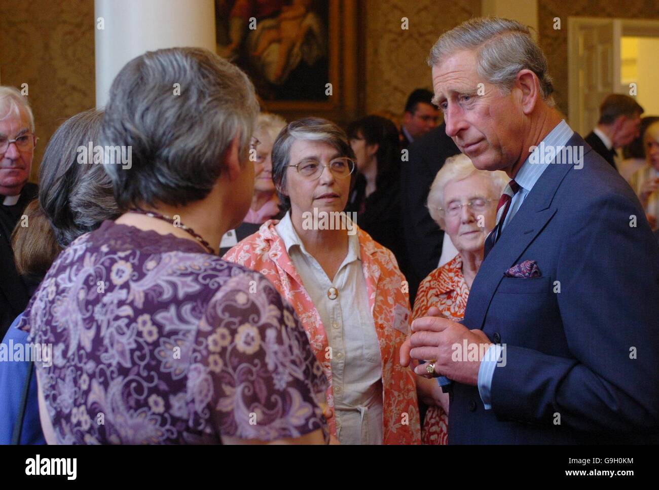 The Prince of Wales meets members of The Prayer Book Society, shortly before he was due to give the inaugural address at its Annual Conference during an evening reception at Lady Margaret Hall in Oxford, Oxfordshire. Stock Photo