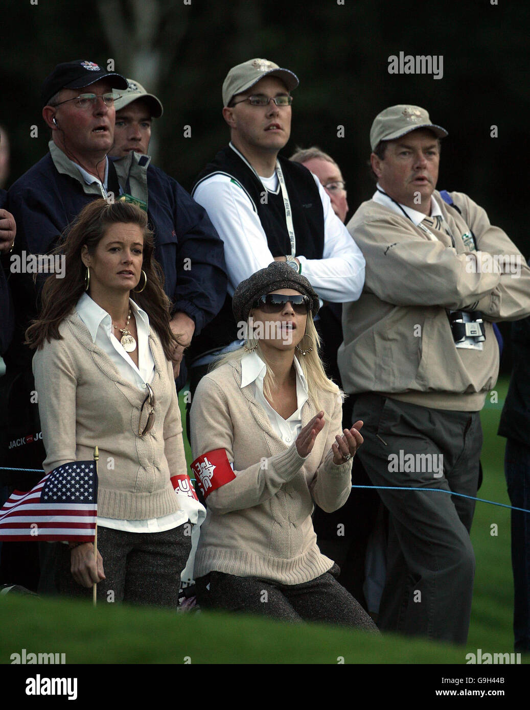 Tiger Woods wife Elin (right) watches her husband putt on the first green, during this mornings Four Ball round at the Ryder Cup, at the K Club in Co Kildare. Friday September 22nd, 2006. Stock Photo