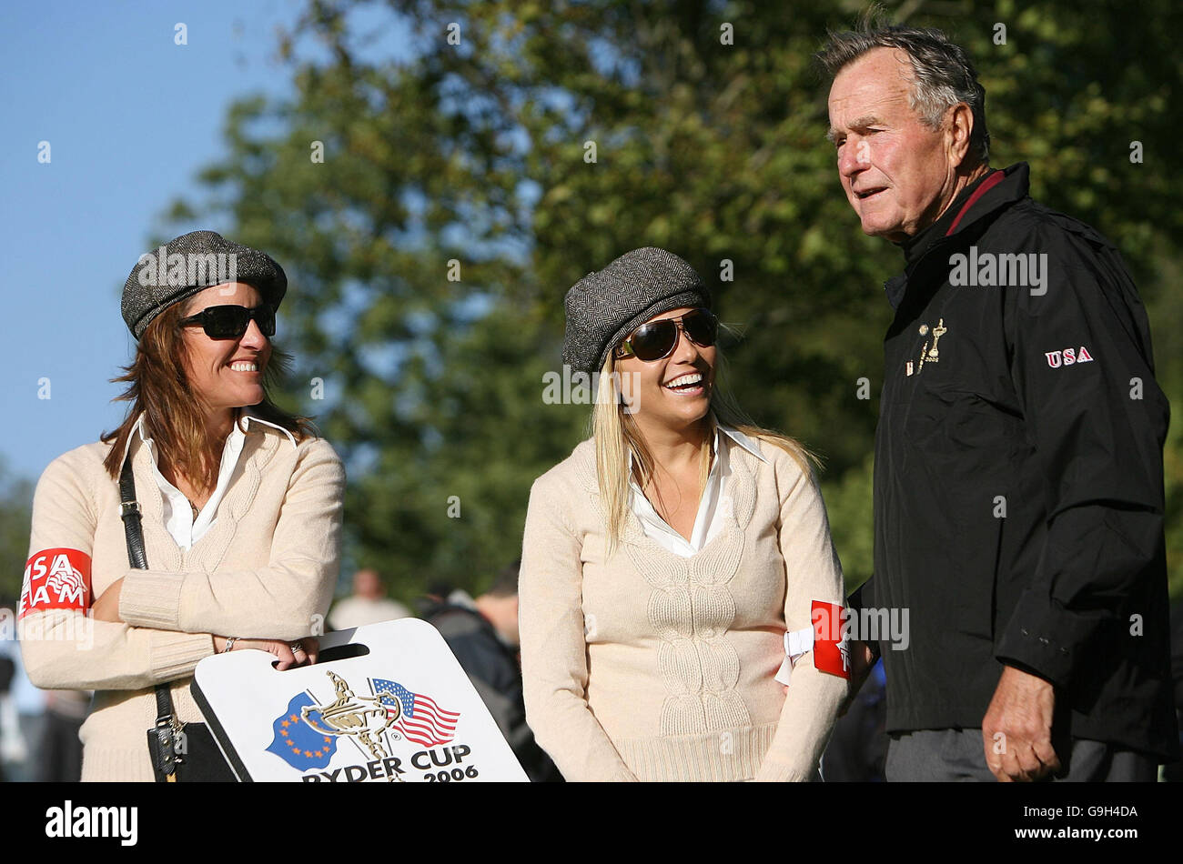 Former US President, George Bush talks to Amy Mickelson (centre) and Amy Di Marco during Day One of the Ryder Cup at the K-Club, Co Kildare, Ireland. Picture date: Friday September 22, 2006. Match Three, Fourballs: USA's Phil Mickelson and Chris Di Marco v Europe's Darren Clarke and Lee Westwood. Photo Credit should read: David Davies/PA Stock Photo