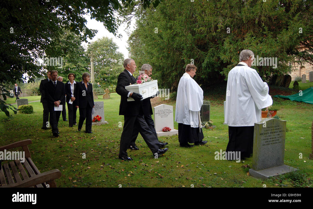 The coffin of baby Lilly is carried to its final resting place at St Mary Magdalen parish church in Great Alne, Warwickshire. Stock Photo