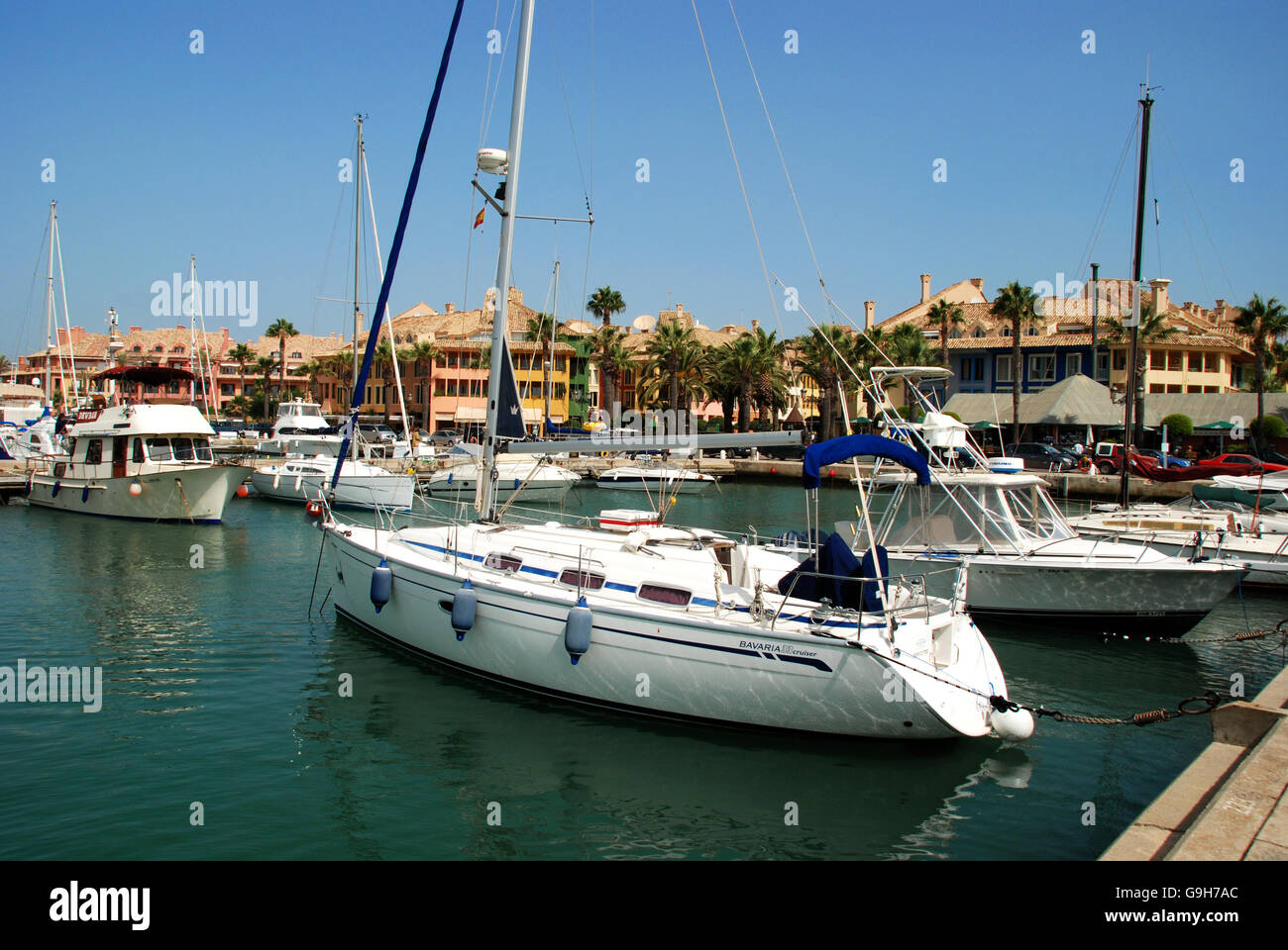 Yachts and boats in the marina with buildings to the rear, Puerto