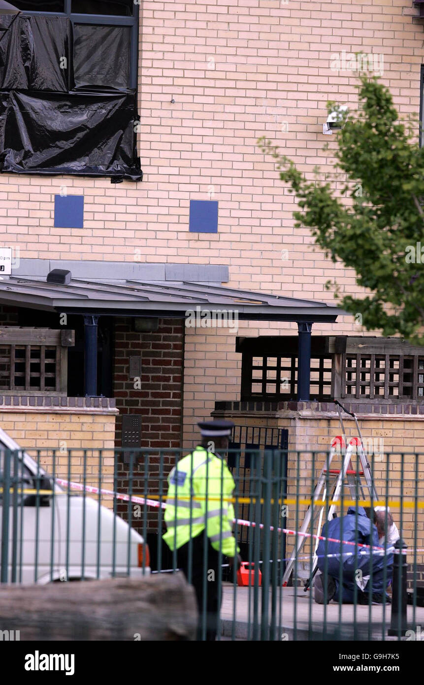 Police forensic teams at work near the scene in Evergreen Square, Hackney after a man was stabbed to death outside his home by a gang of youths, police said today. Stock Photo