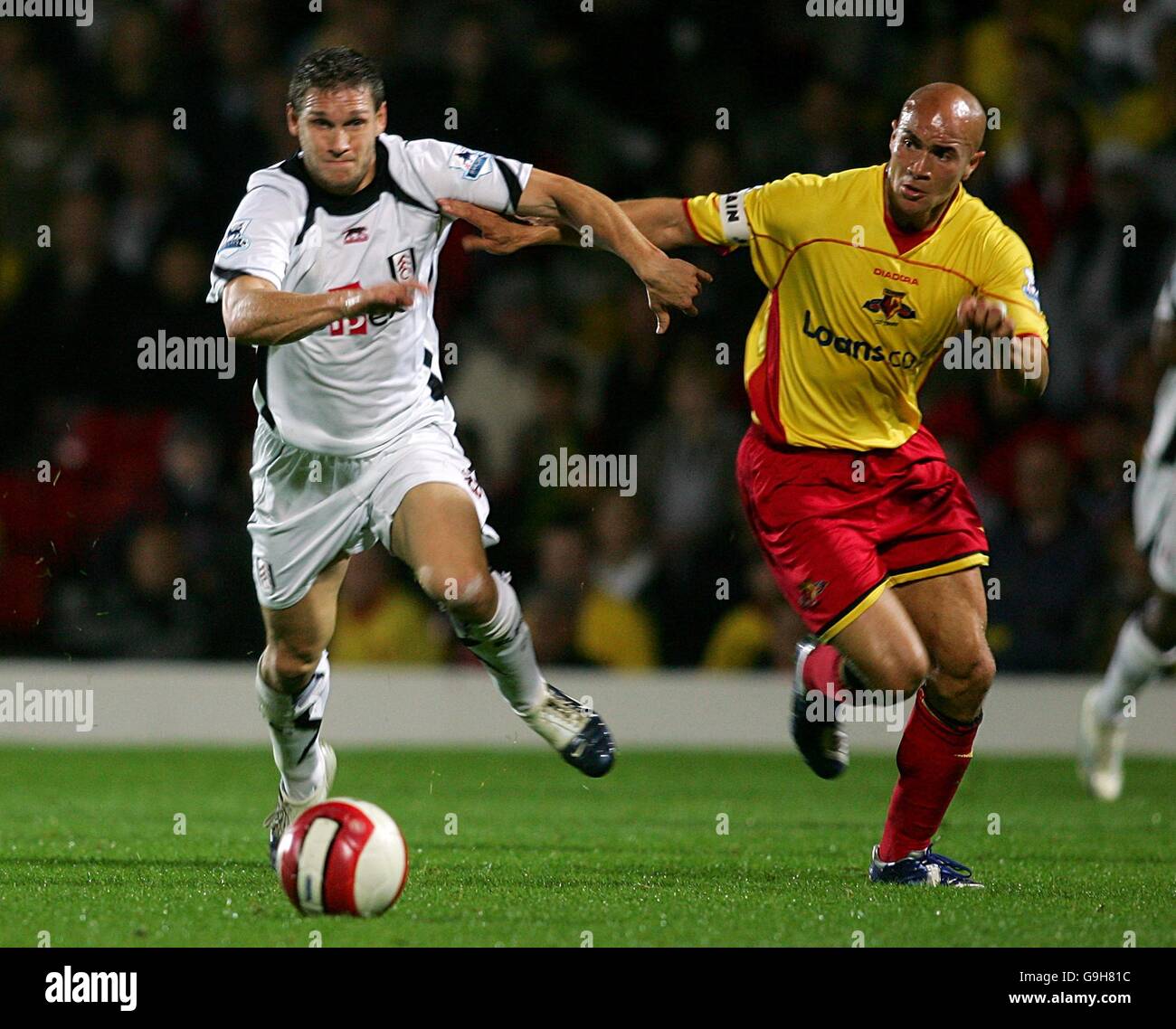 Soccer - FA Barclays Premiership - Watford v Fulham - Vicarage Road. Watford's Gavin Mahon and Fulham's Moritz Volz Stock Photo