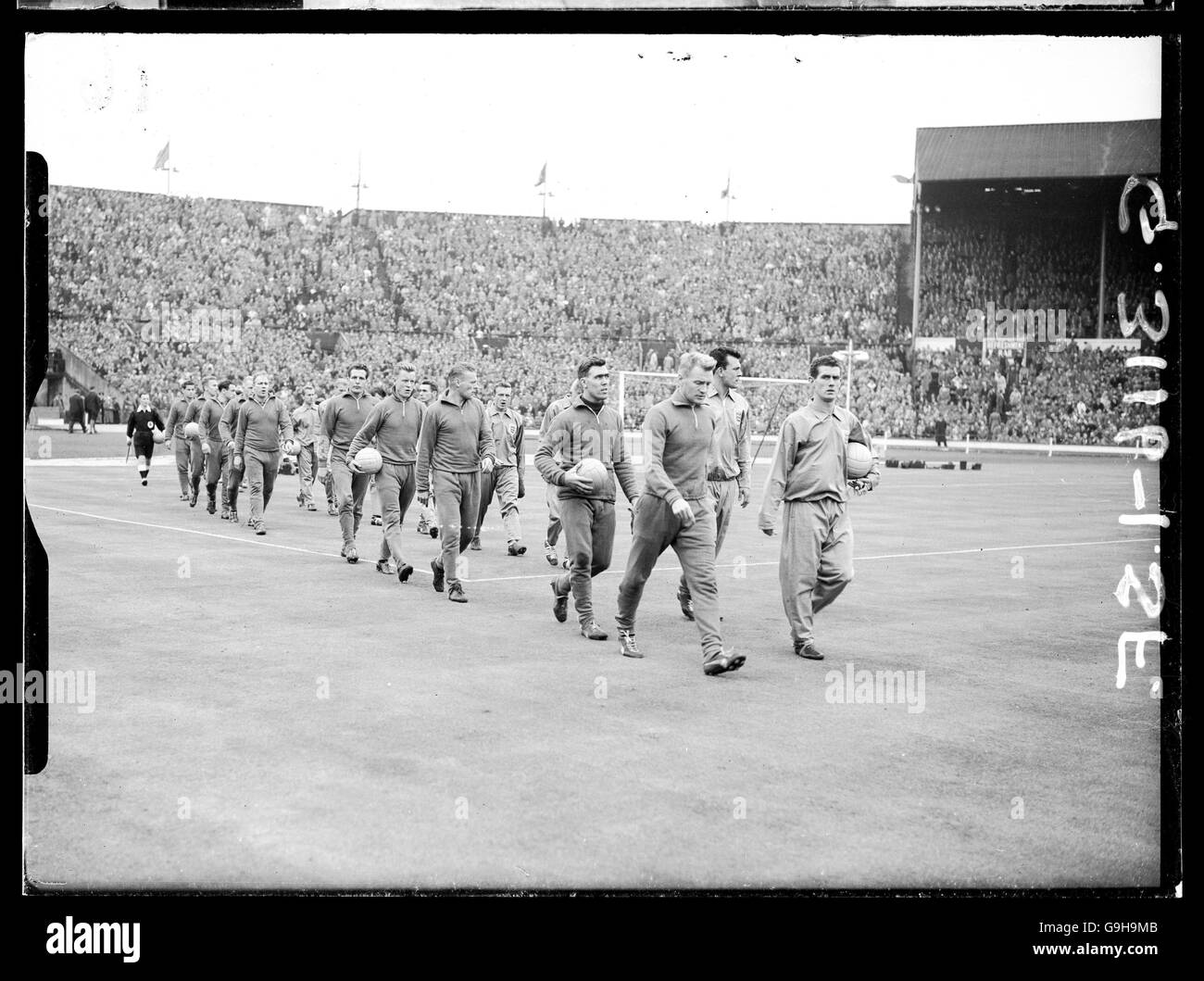 Soccer - Friendly - England v Sweden. The two teams walk out onto the Wembley pitch before the match Stock Photo