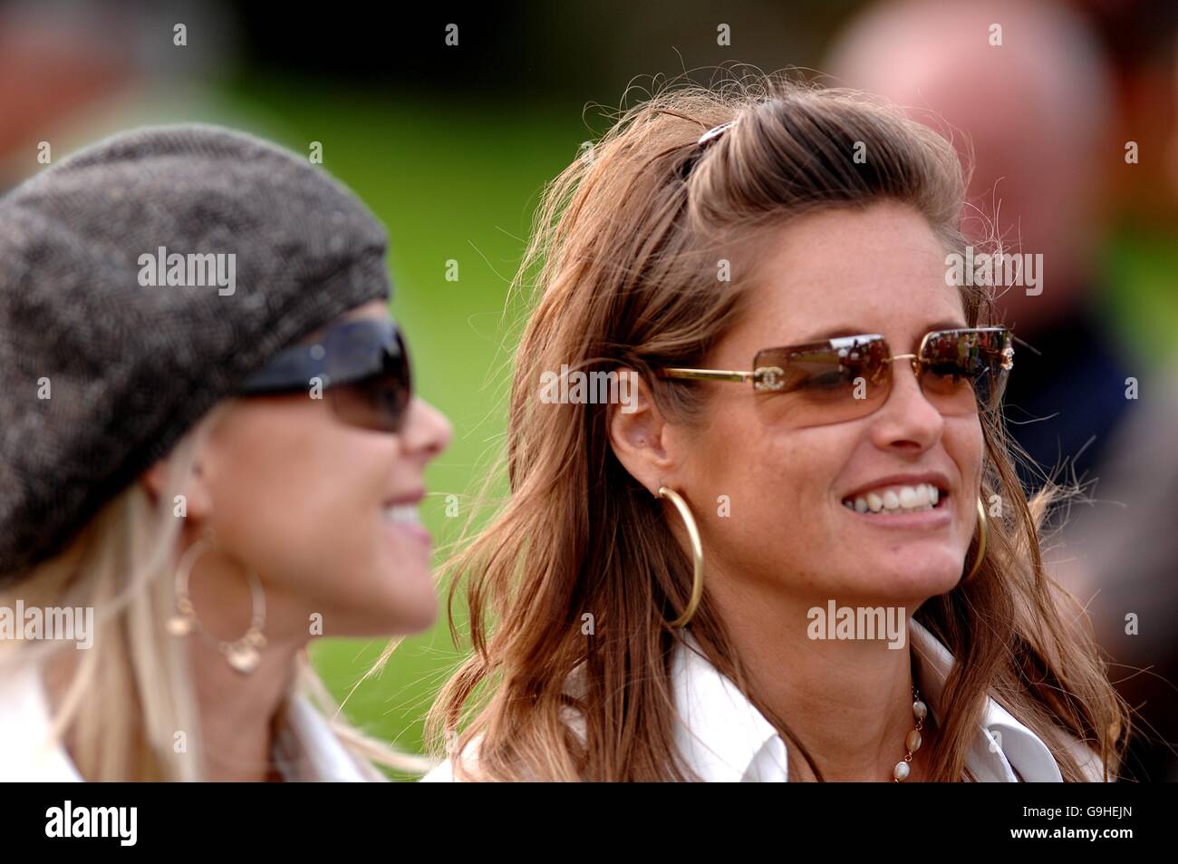 Jim Furyk's wife Tabitha (r) and Tiger Woods wife Elin Stock Photo