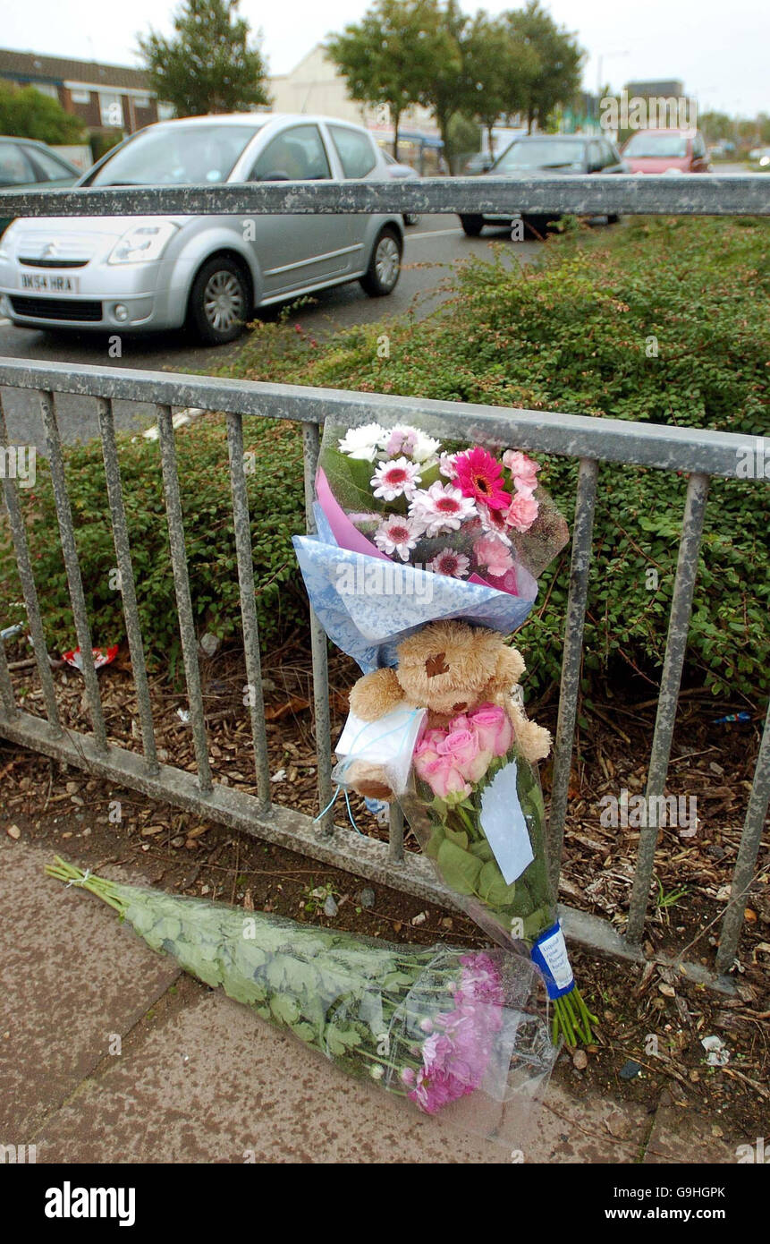 Flowers left near the scene on Coventry Road, at the junction with Ada Road in Birmingham after a 28-year-old mother, her unborn child and nine-year-old son were killed when they were in collision with a car, police said today. Stock Photo