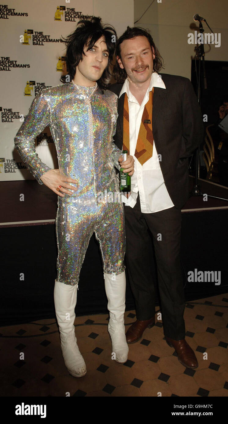 The Mighty Boosh's Noel Fielding (Left) and Julian Barratt are photographed in the press room at The Secret Policeman's Ball concert - which launches Amnesty International's 'Protect The Human Week' - at The Royal Albert Hall in London. Stock Photo
