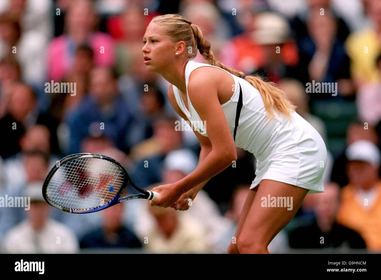 Tennis - Wimbledon Championships - Ladies' Singles - First Round - Anna Kournikova v Sandrine Testud Stock Photo