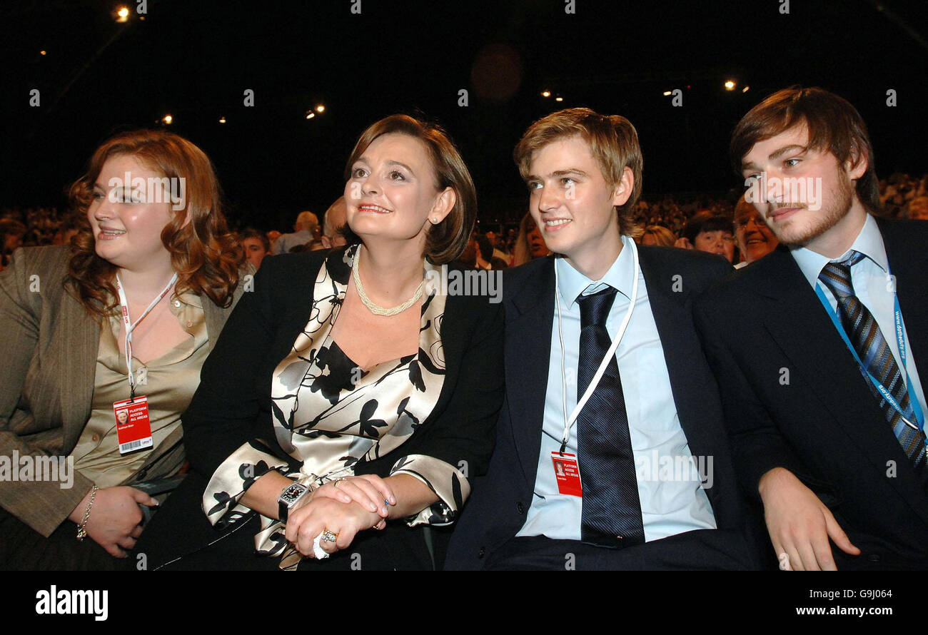 Cherie Blair sits with daughter Kathryn (left) and her sons Euan and Nicky (far right), during a speech by their father Prime Minister Tony Blair to the Labour Party conference in Manchester. Stock Photo