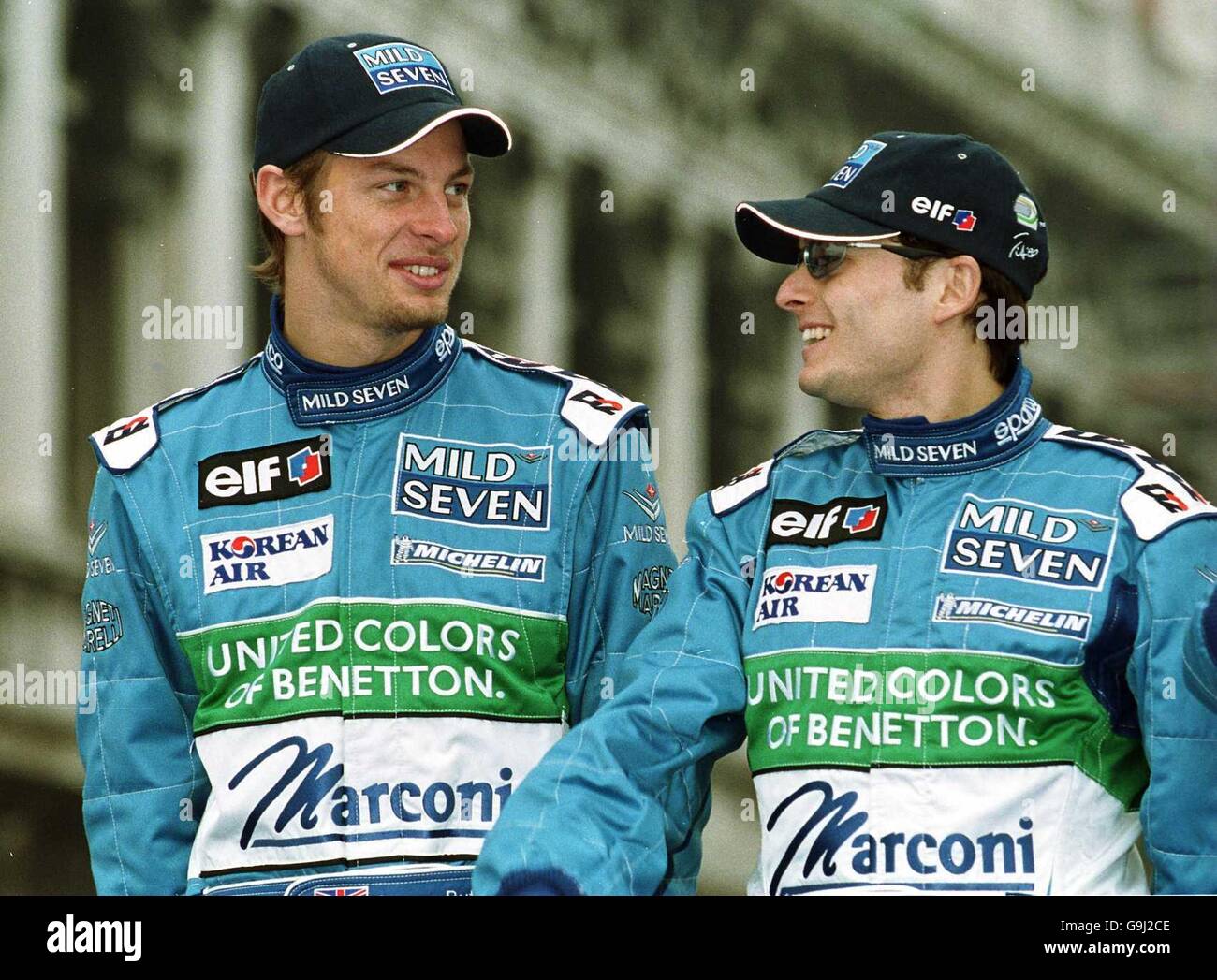 Jenson Button and Giancarlo Fisichella at the launch of the Mild Seven  Benetton Renault Sport B201 car in Venice Stock Photo - Alamy