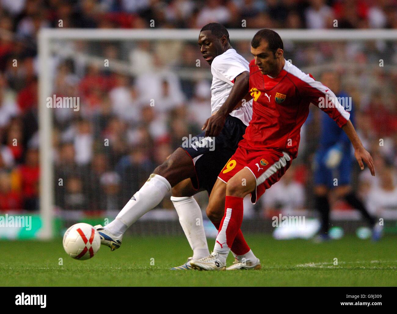 Goran Pandev, FYR Macedonia and Ledley King, England battle for the ball Stock Photo