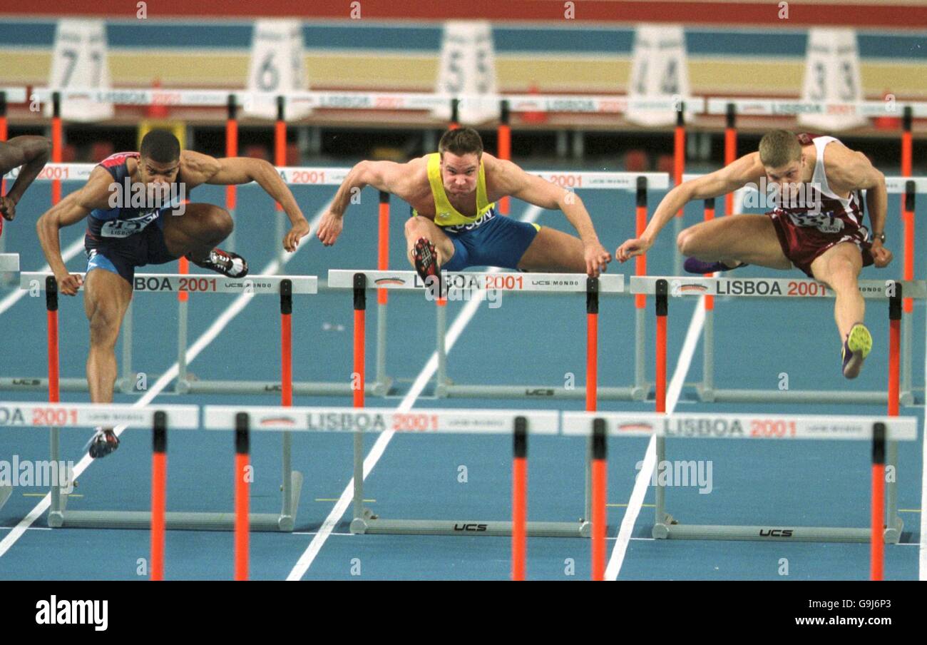 Sweden's Robert Kronberg (c) and America's Terrence Trammell (l) and Lativa's Stanislavs Olijars in action in the men's 60m hurdles Stock Photo